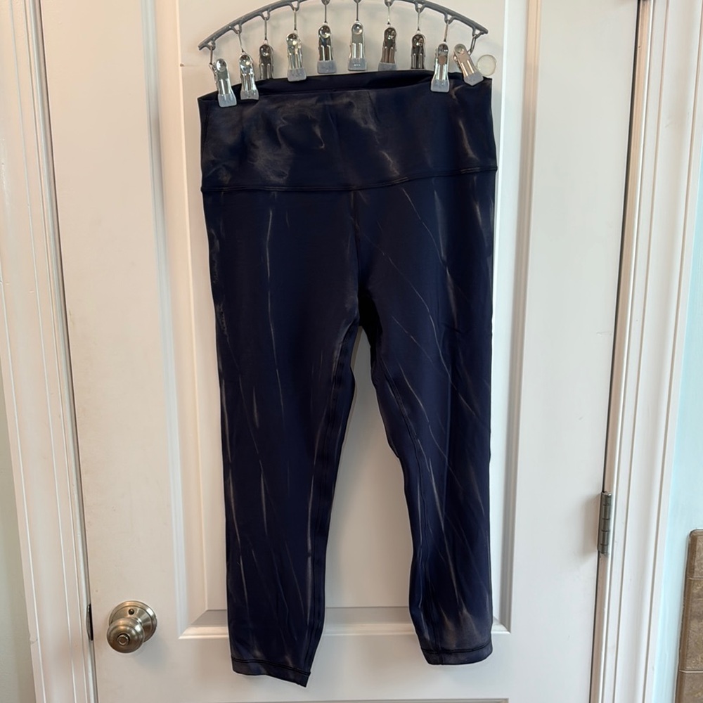 Lululemon Wunder Train High-Rise Crop 23"
Sun Bleached Wash True Navy. Size 12.